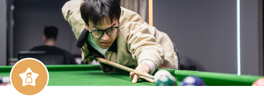 Intense concentration during billiards game