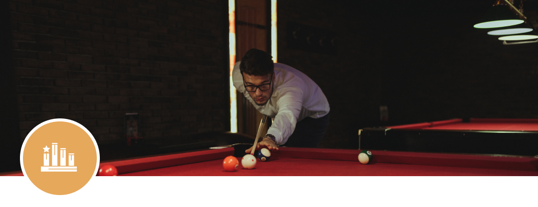Pool game in progress, intense concentration