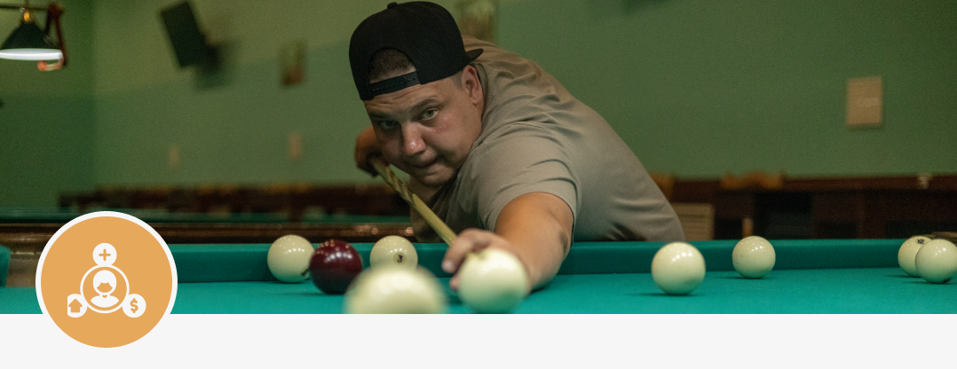 Man aiming in pool game