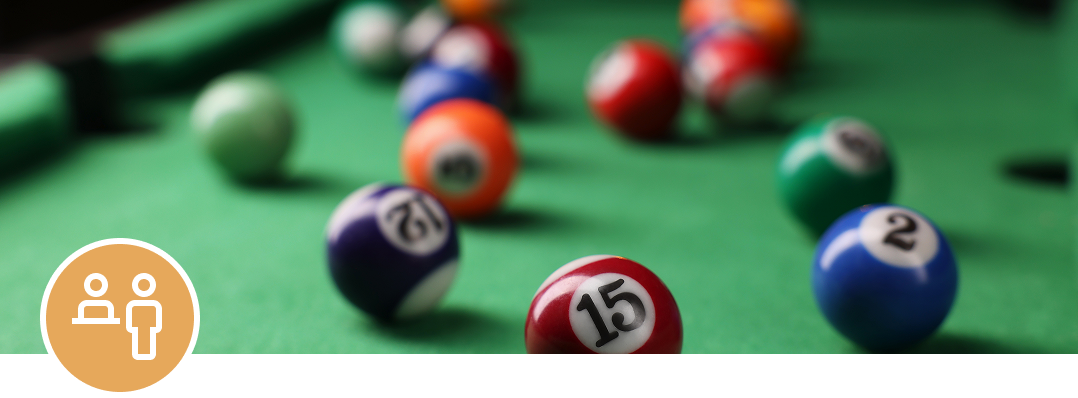 Numbered billiard balls ready for play