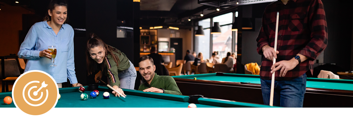 Group enjoying billiards at a pub