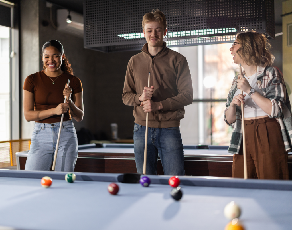 Group enjoying a game of pool